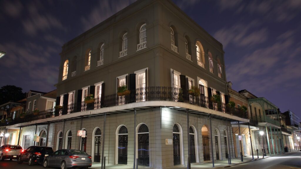 An eerie long exposure nighttime image of the legendary and historic LaLaurie Mansion in the French Quarter at the corner - New Orleans, Louisiana, USA - April 29, 2019