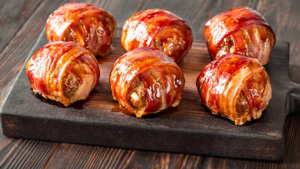 Bacon wrappped meatballs stuffed with cheese