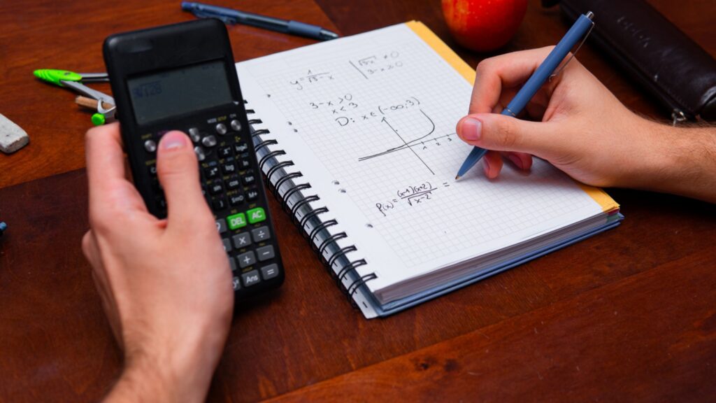 student calculates complex math problems using a scientific calculator