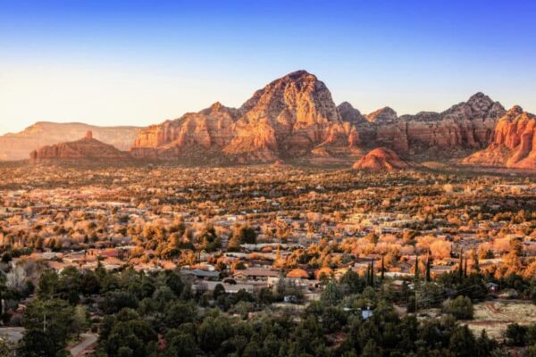 Birds eye view to the city of Sedona, Arizona and the Red Rocks at sunset