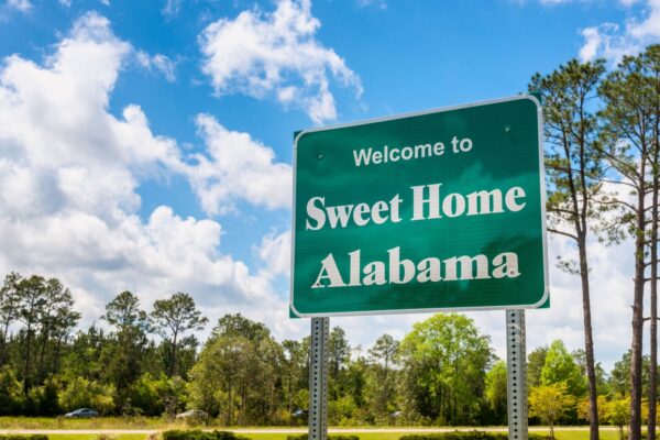 Welcome to Sweet Home Alabama Road Sign along Interstate 10 in Robertsdale, Alabama USA, near the State Border with Florida