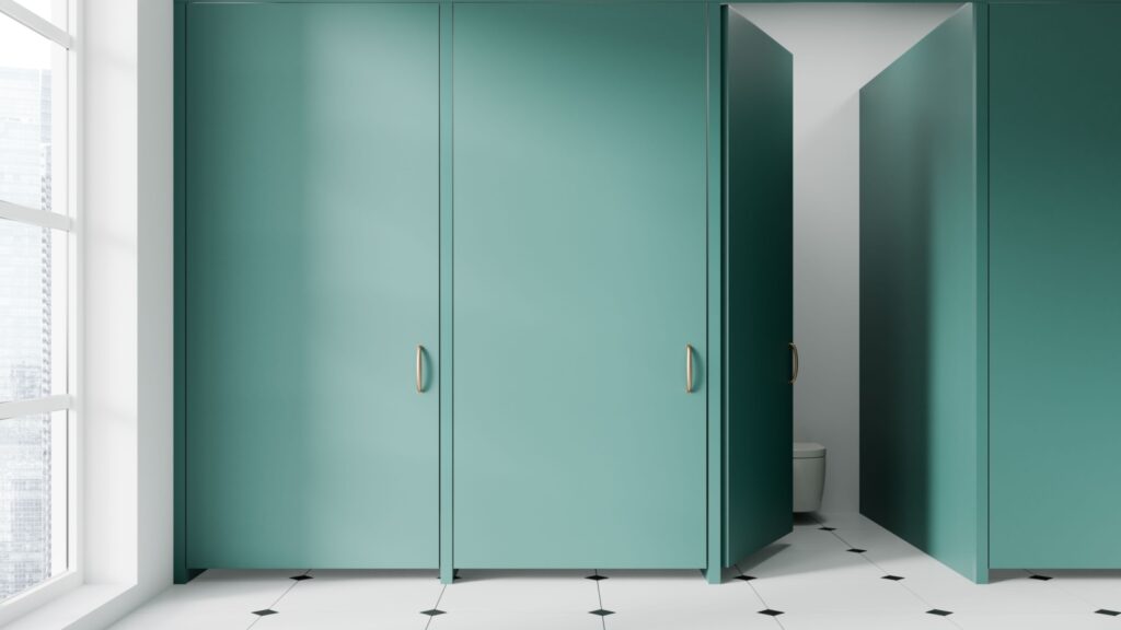 Light green public bathroom interior toilet cubicles and opened door, tile concrete floor. Panoramic window on skyscrapers. Restroom in hotel or shopping mall. 3D rendering