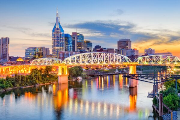 Nashville, Tennessee, USA downtown skyline on the Cumberland River.