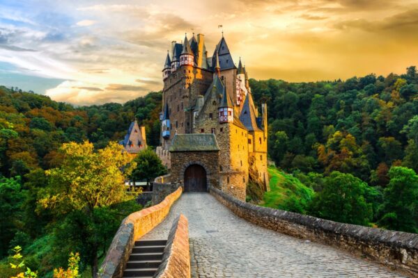 wonderful romantic Medieval castles of Germany in autumn colours over sunset Burg Eltz, one of the most beautiful in Europe