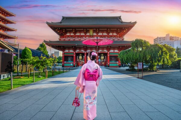 Asian woman wearing japanese traditional kimono at Temple in Tokyo, Japan.