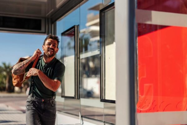 Man running to catch the bus