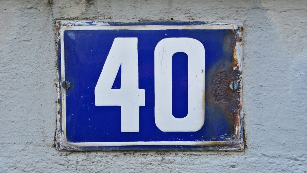 A house number plaque, showing the number forty (40)