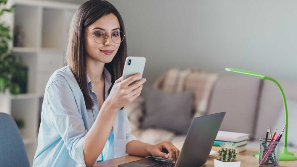 Woman with mobile during work