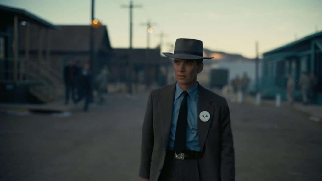 A man dressed in 1950s clothing for the movie oppenheimer