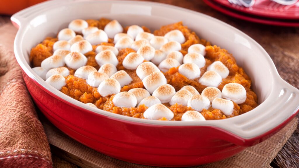 A delicious homemade sweet potato casserole with marshmallow topping.