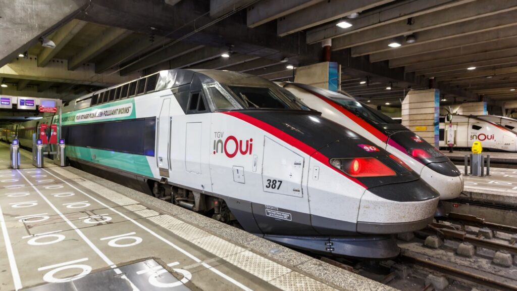 Paris, France - June 6, 2022: TGV high-speed trains of SNCF at Gare Montparnasse railway station in Paris, France.