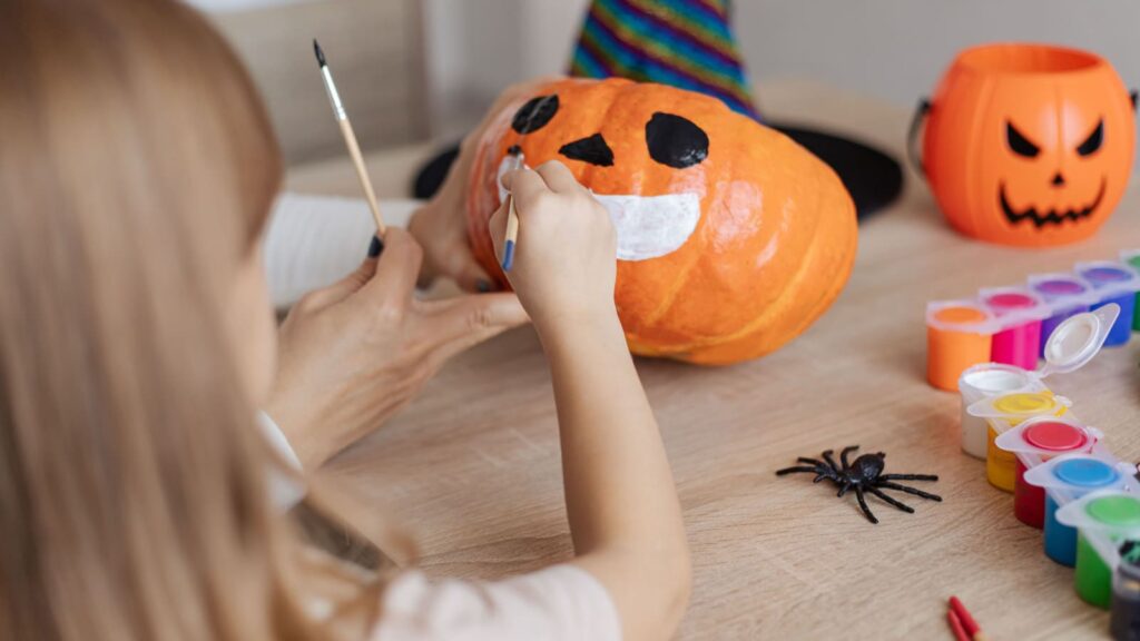 Pumpkin painting children for halloween