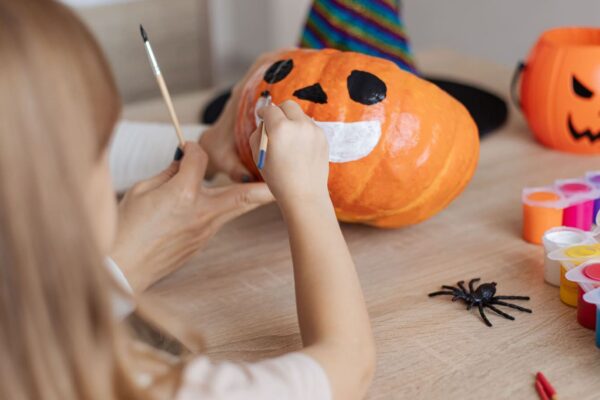 Pumpkin painting children for halloween