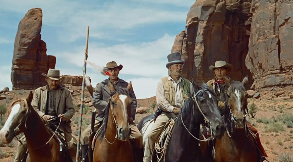 Ward Bond, Ken Curtis, John Qualen, and William Steele in The Searchers (1956)