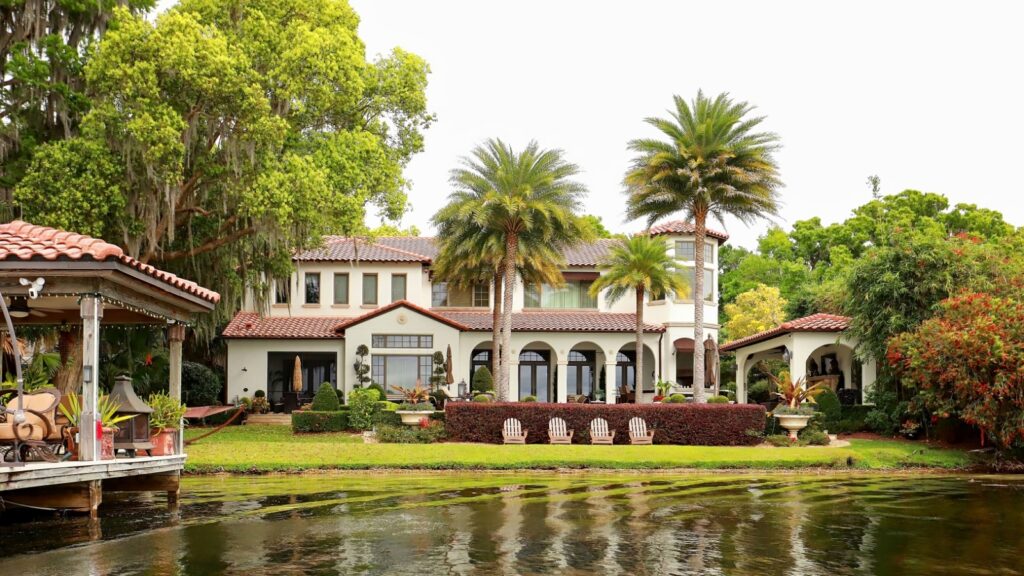 WINTER PARK, FLORIDA, USA: Beautiful home and boathouse in the Chain of Lakes as seen from a scenic boat tour on March 20, 2021.