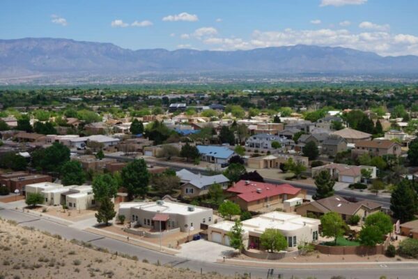 Panoramic view of city of Albuquerque, New Mexico with mountain range in the background