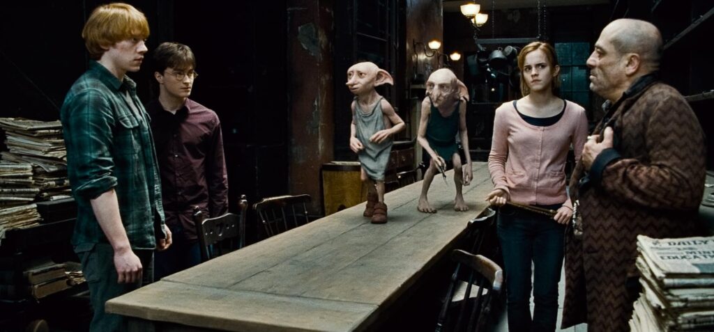 Rupert Grint, Toby Jones, Andy Linden, Simon McBurney, Daniel Radcliffe, and Emma Watson in Harry Potter and the Deathly Hallows: Part 1 (2010)