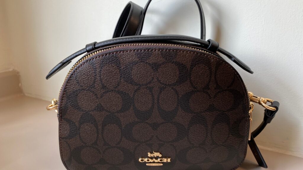 Kuala Lumpur - 1.1.2021 Exclusive Coach Sling Bag with engraved name at side.